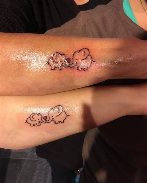 2 daughters tattoo|cute matching mother daughter tattoos.